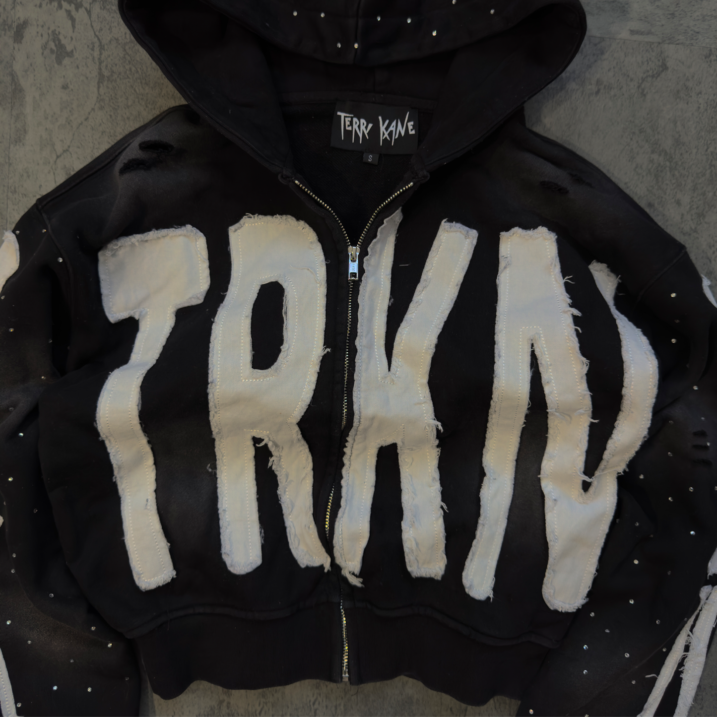 “TRKN” cropped distressed rhinestone zip up hoodie