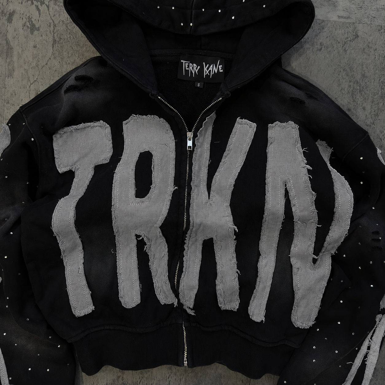 “TRKN” cropped distressed rhinestone zip up hoodie **SIZE UP ONE**